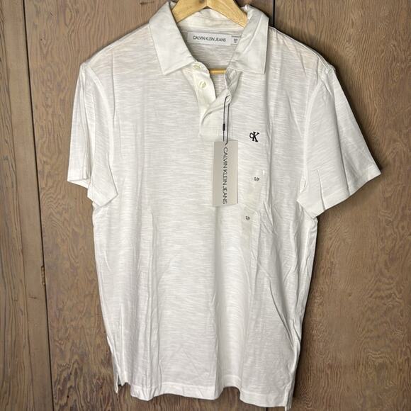 NWT Calvin Klein Jeans White With Black Logo Polo Shirt Size Small - Picture 1 of 5
